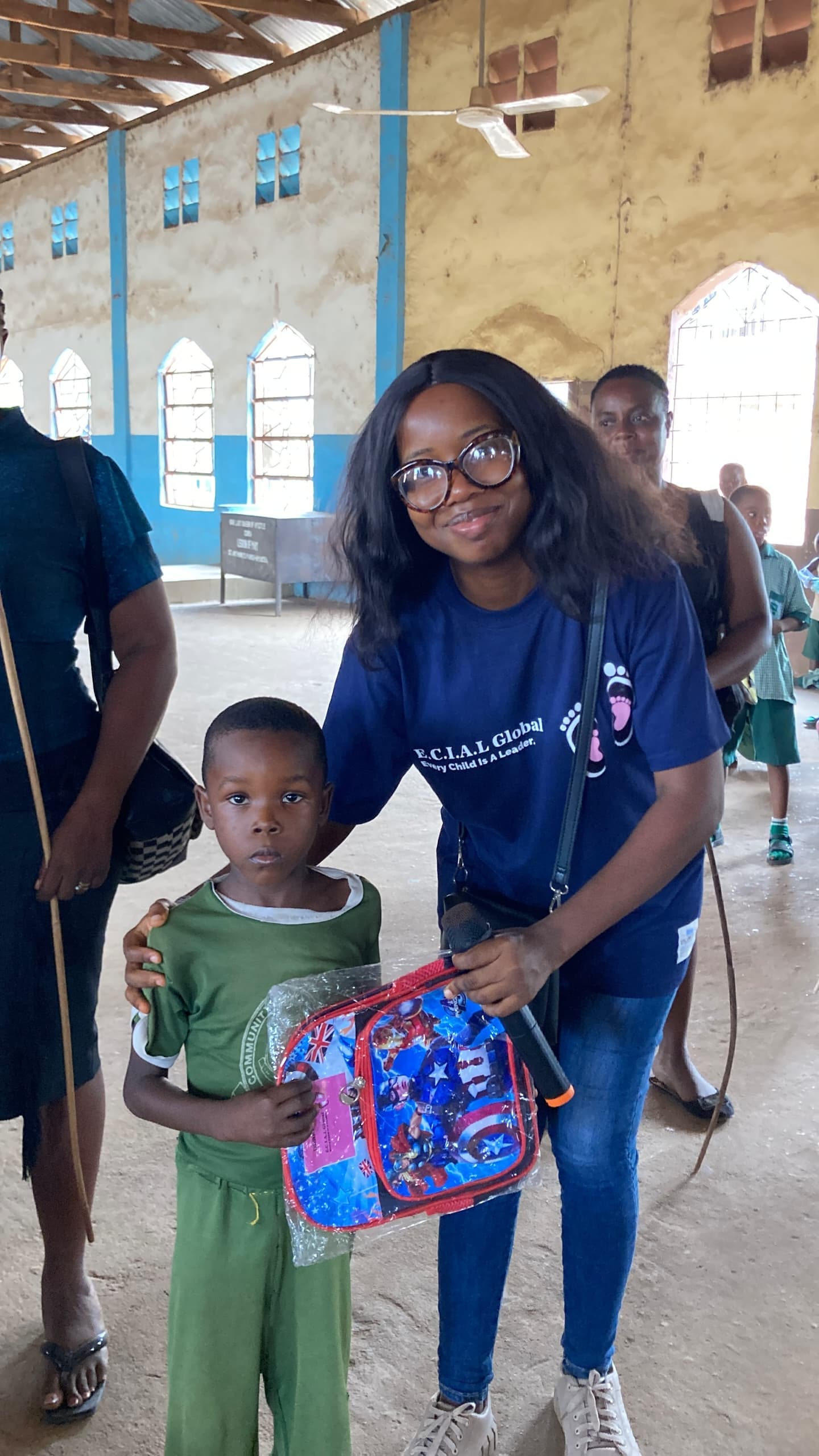 Emmanuella giving out a gift