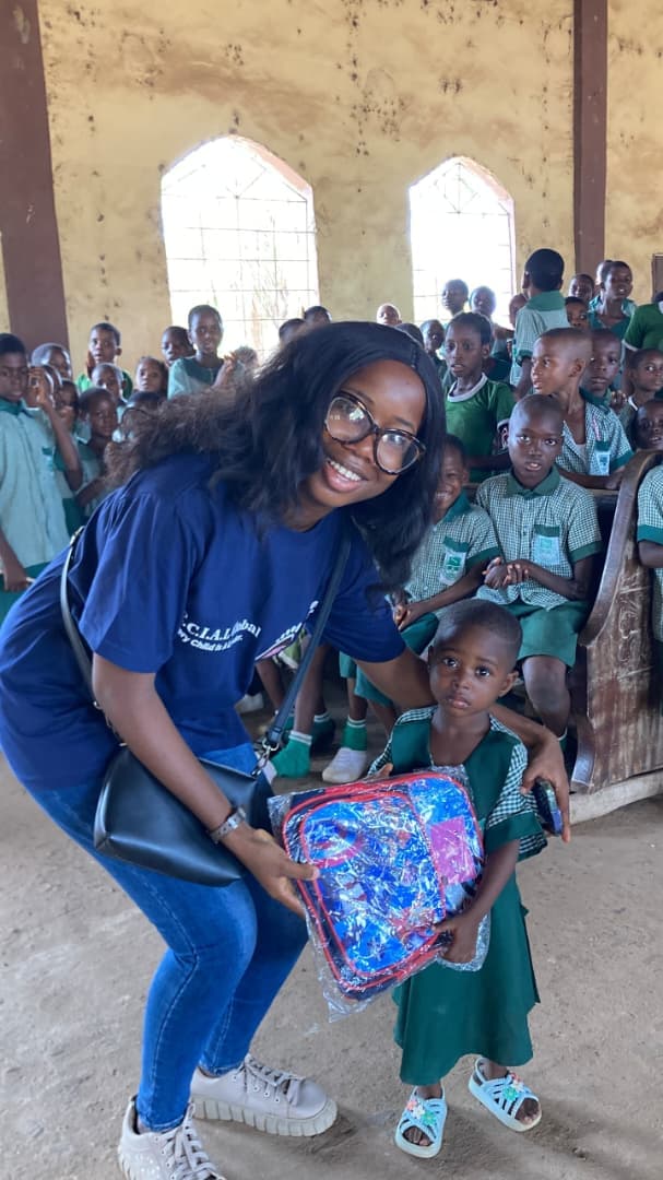 Emmanuella giving out a gift