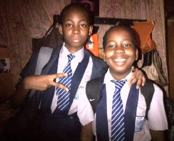 Emmanuella (10) and her sister Vanessa (12) during their school days
